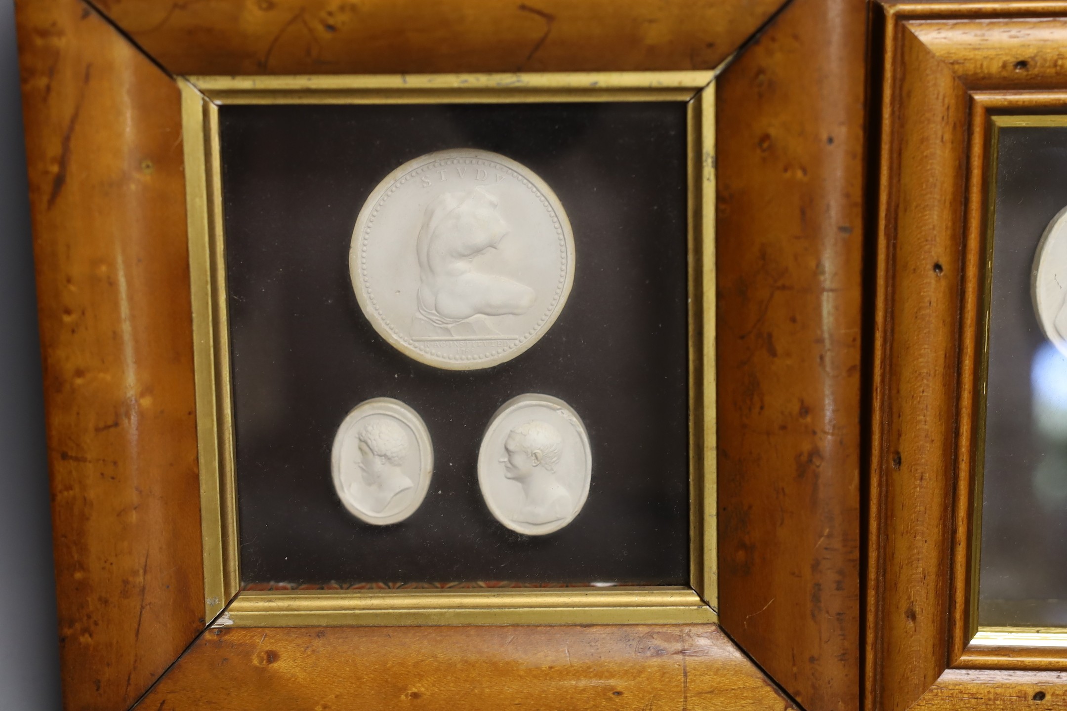 Two framed groups of classical portrait reliefs